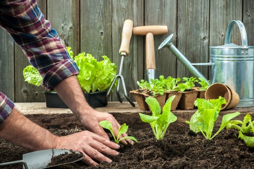 Front view of a gardener working in a residential Erith garden