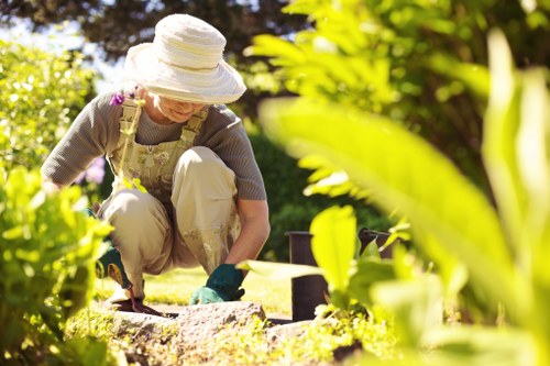 First aid kit and emergency equipment beside gardening tools